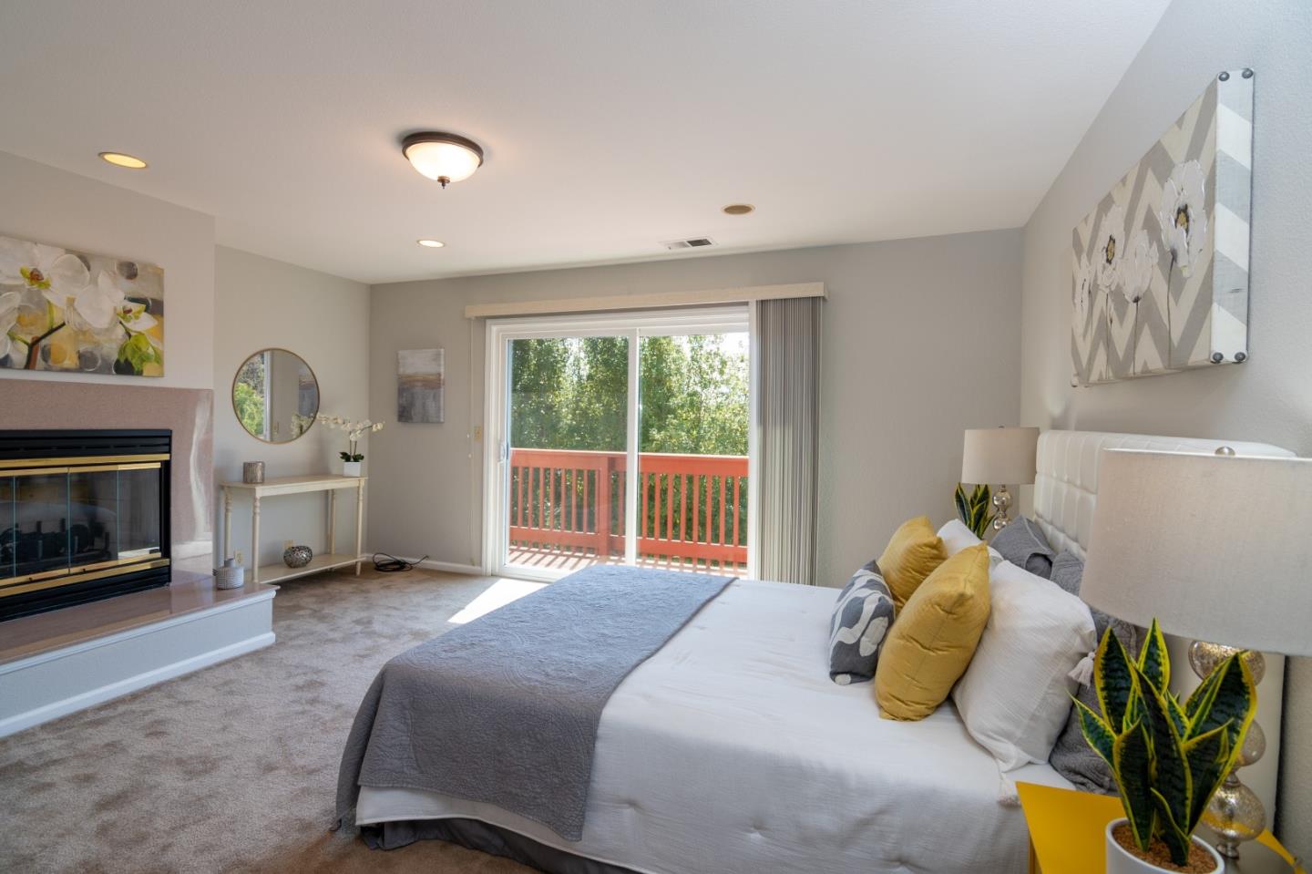 4638 Borina Drive San Jose, CA 95129 - Photo 12 of 24 a bedroom with a bed and a fireplace