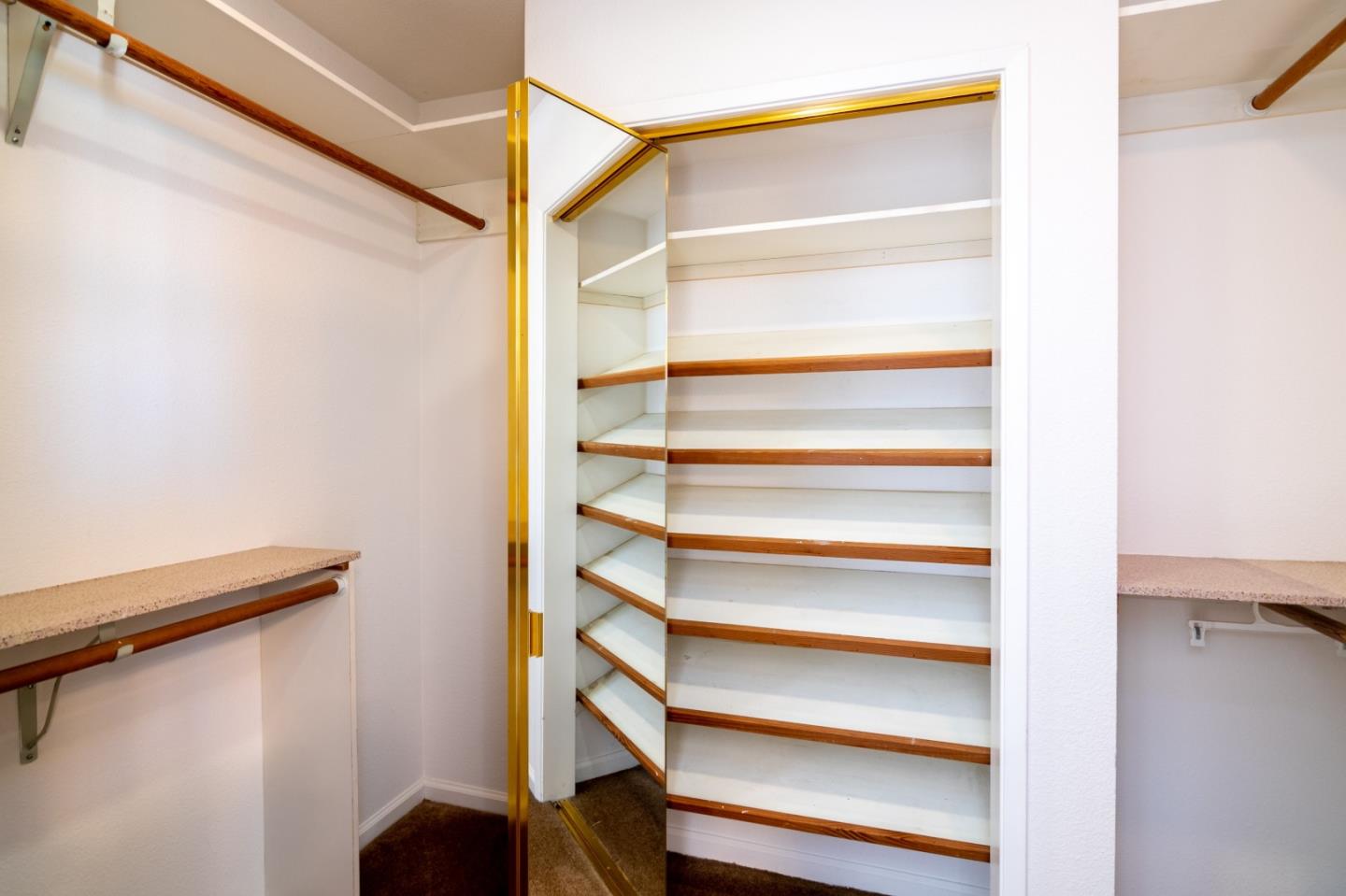 4638 Borina Drive San Jose, CA 95129 - Photo 13 of 24 a view of walk in closet with empty racks