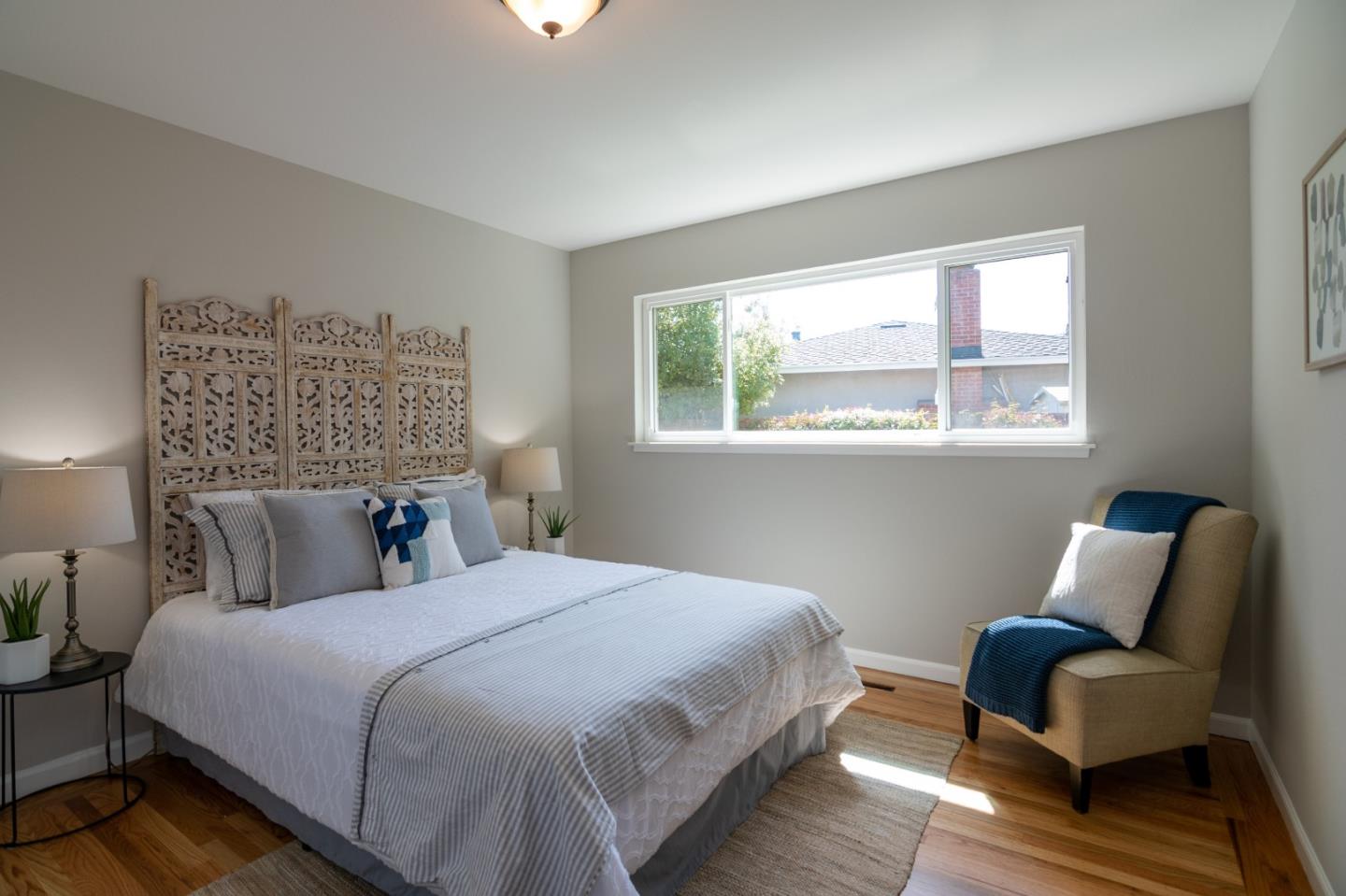 4638 Borina Drive San Jose, CA 95129 - Photo 15 of 24 a bedroom with a bed and a couch