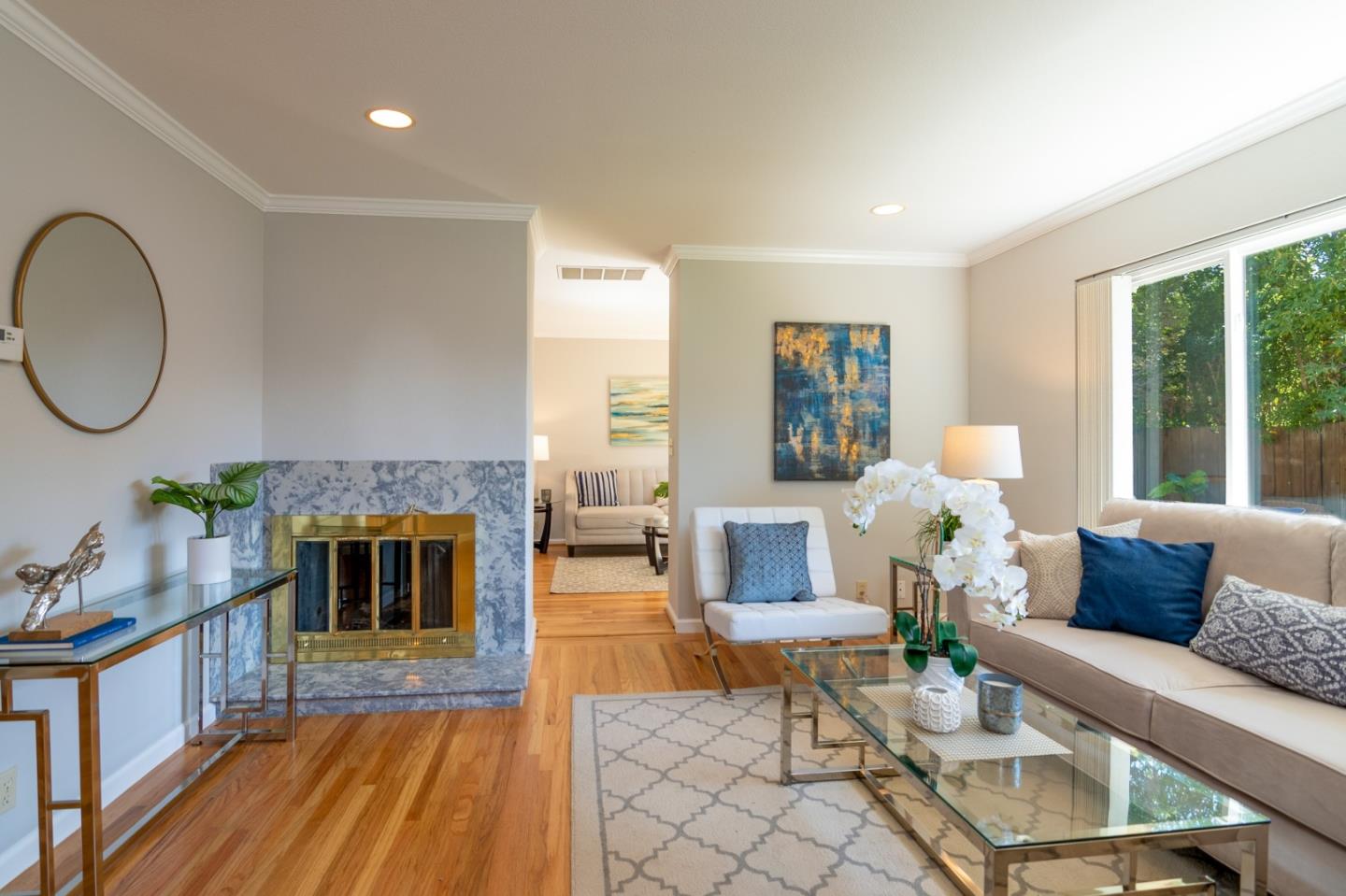 4638 Borina Drive San Jose, CA 95129 - Photo 5 of 24 a living room with furniture and a fireplace