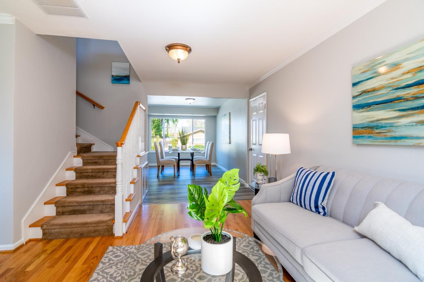 4638 Borina Drive San Jose, CA 95129 - Photo 7 of 24 a living room with furniture and a potted plant