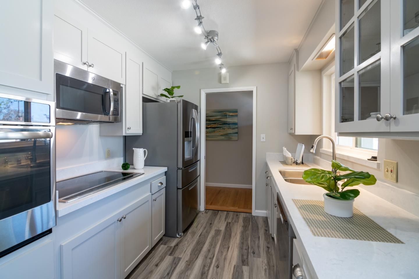 4638 Borina Drive San Jose, CA 95129 - Photo 10 of 24 a kitchen with refrigerator and microwave