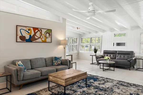 a kitchen with stainless steel appliances granite countertop a stove a refrigerator and a sink