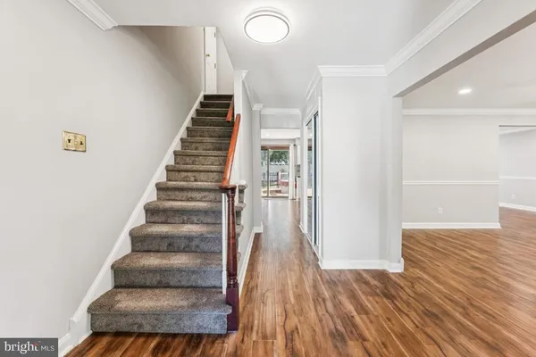 a view of entryway with wooden floor
