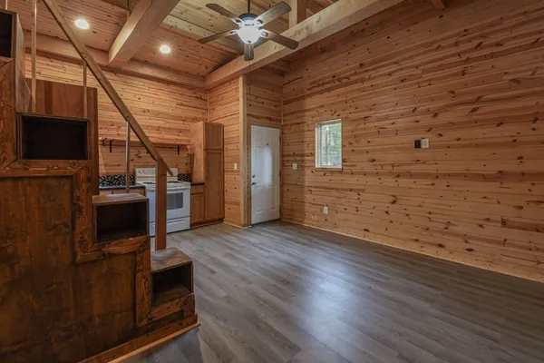 a view of a storage & utility room with wooden floor