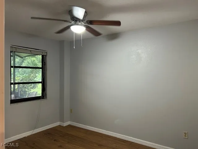 a view of a bathroom with a shower curtain