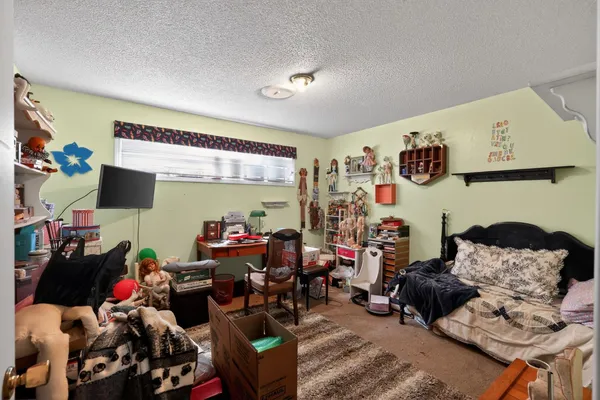 a room with furniture and a bed