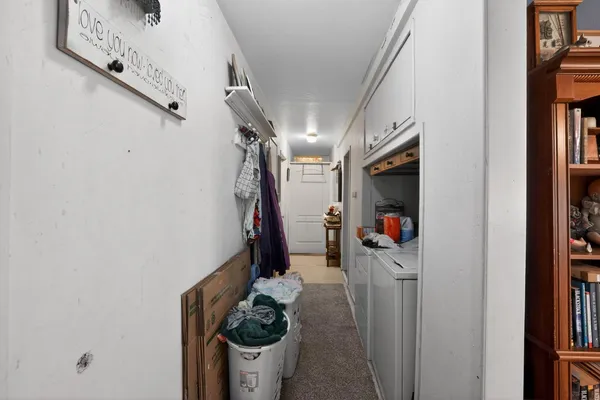 a room with lots of stuff and white walls