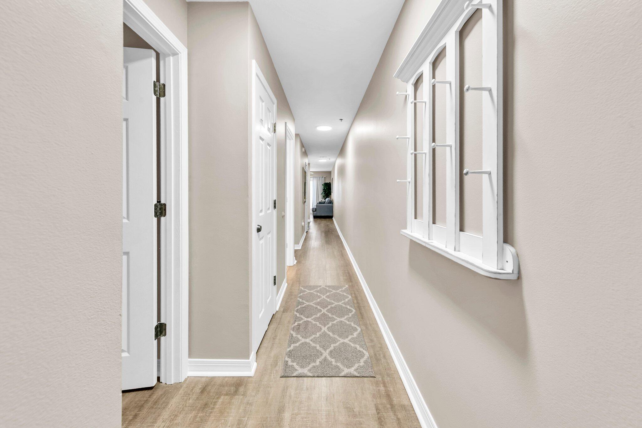 wooden floor with a white door