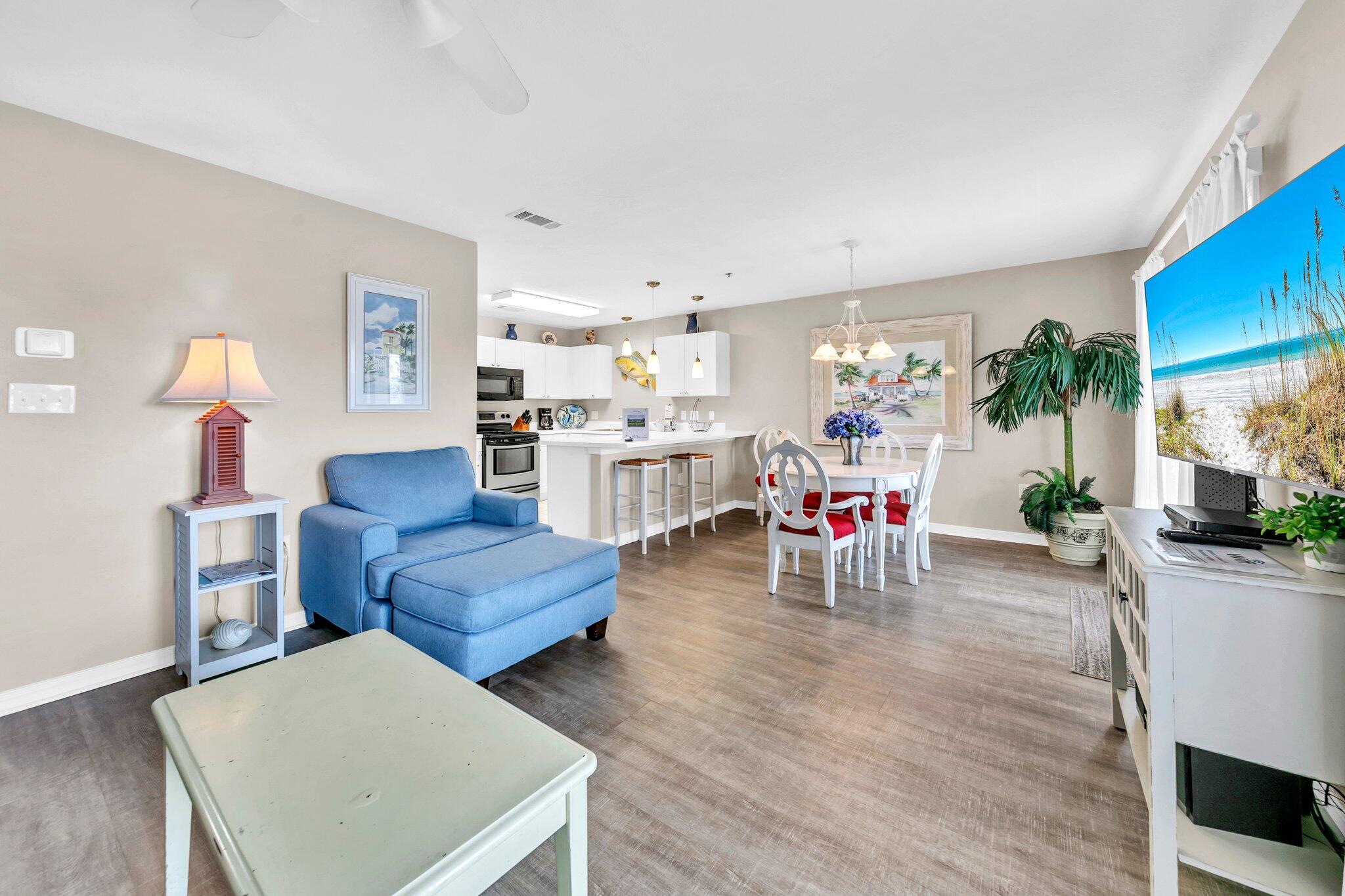 144 Spires Lane, Unit 202 Santa Rosa Beach, FL 32459 - Photo 11 of 31 a living room with furniture and wooden floor