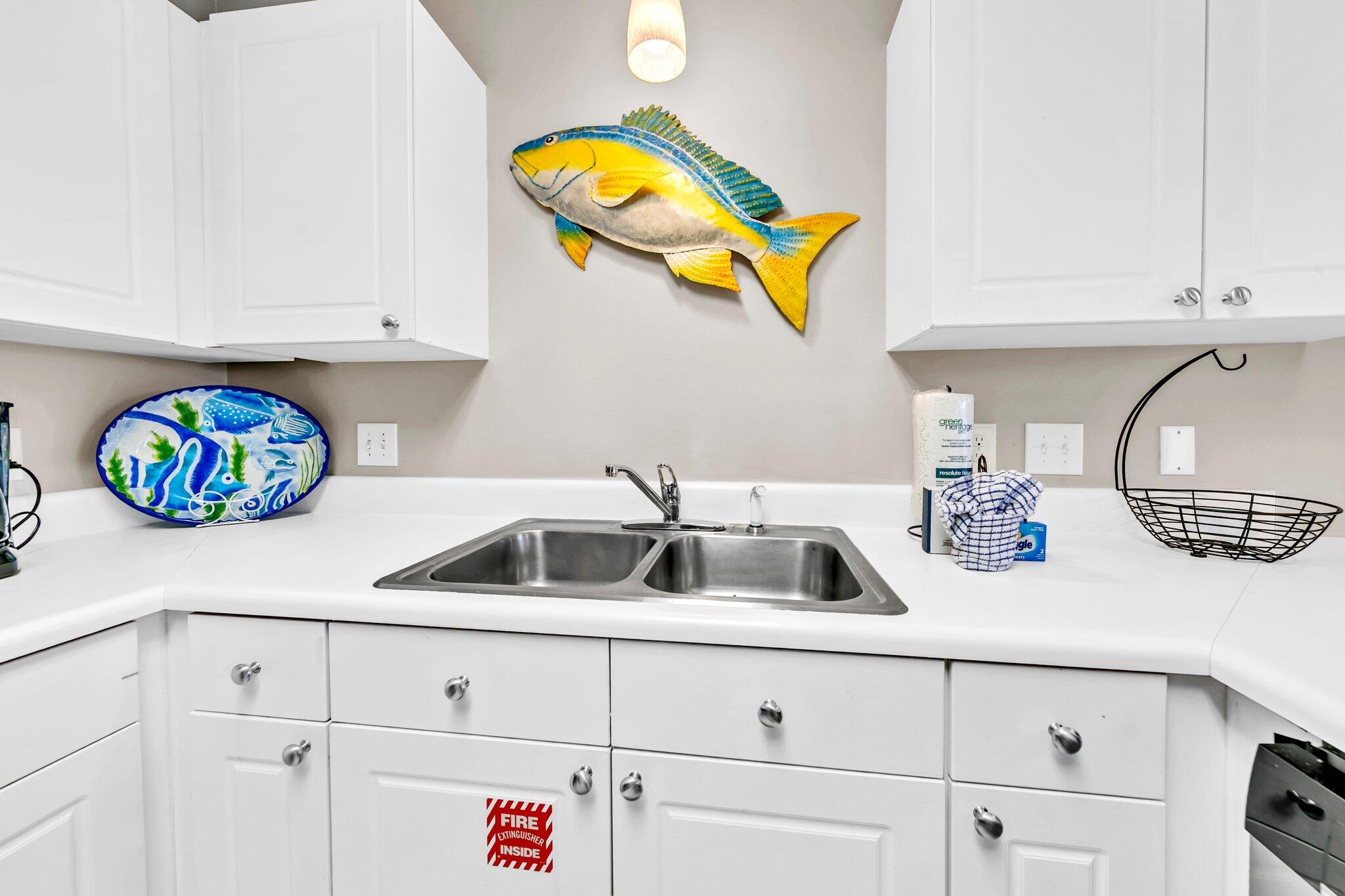 144 Spires Lane, Unit 202 Santa Rosa Beach, FL 32459 - Photo 17 of 31 a kitchen with sink and cabinets