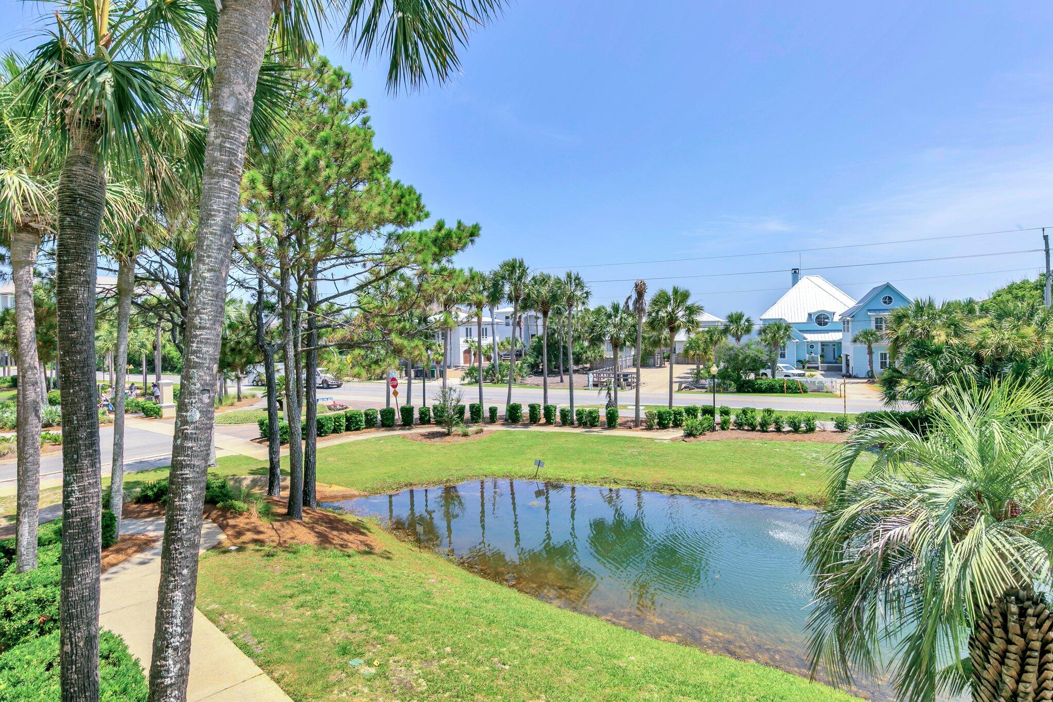 144 Spires Lane, Unit 202 Santa Rosa Beach, FL 32459 - Photo 24 of 31 a view of a lake with a yard