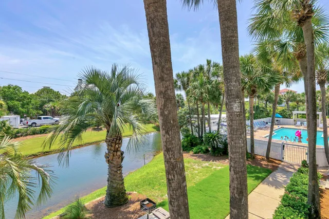 a view of a swimming pool and a yard