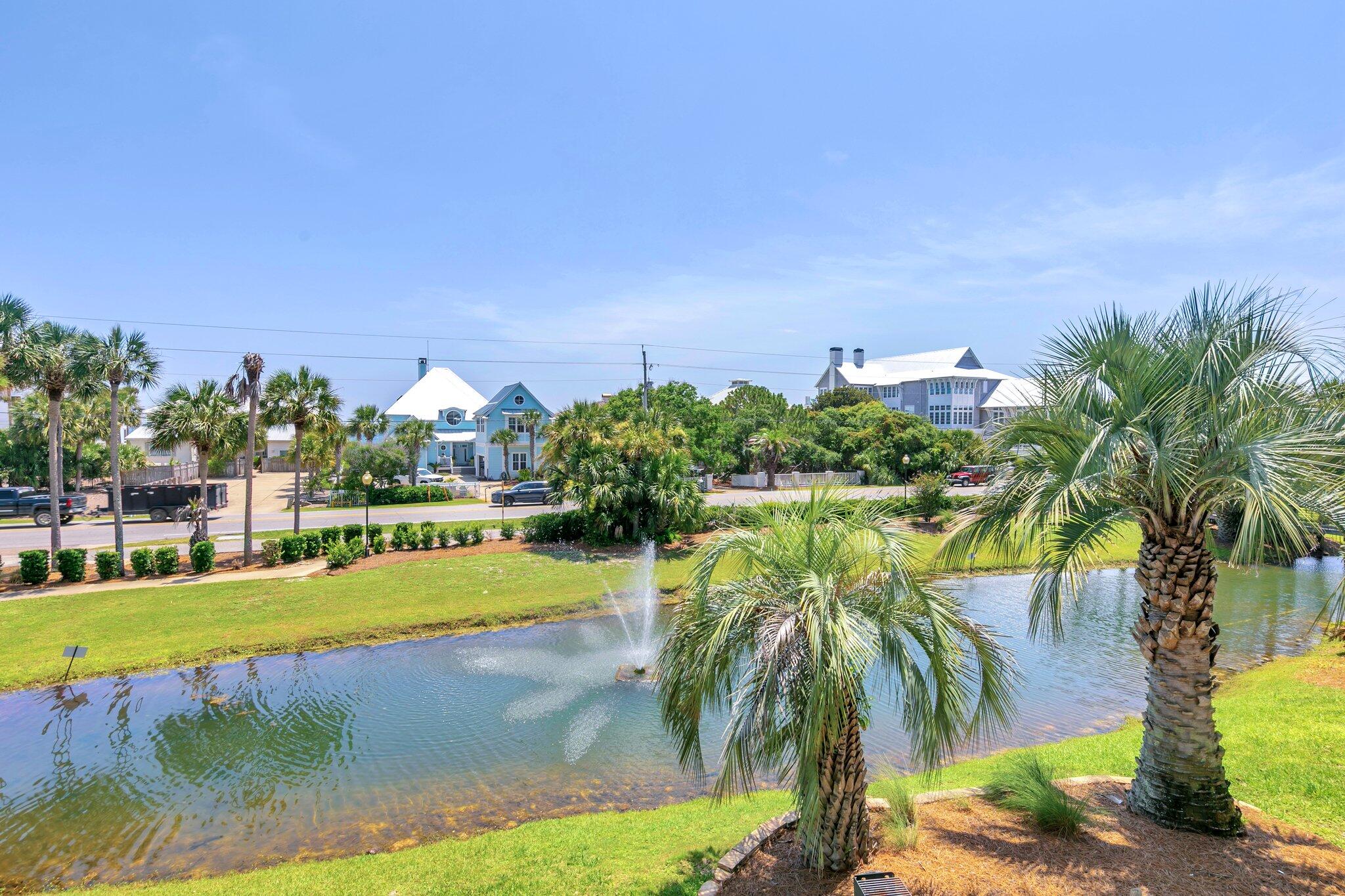 144 Spires Lane, Unit 202 Santa Rosa Beach, FL 32459 - Photo 28 of 31 a view of a swimming pool with a yard