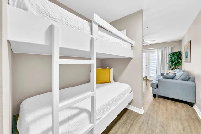 a bedroom with a bed and a couch