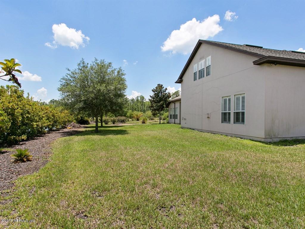2048 River's Own Road St. Augustine, FL 32092 - Photo 27 of 38 a view of a house with backyard and sitting area