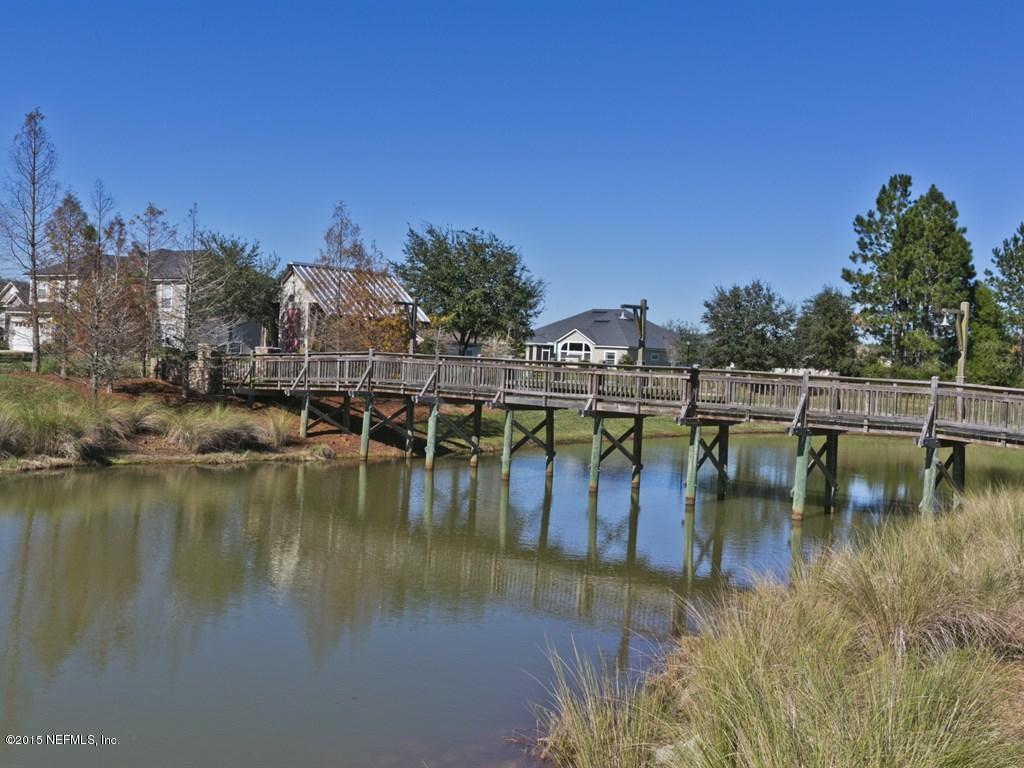 2048 River's Own Road St. Augustine, FL 32092 - Photo 29 of 38 a view of a lake with boats and trees around