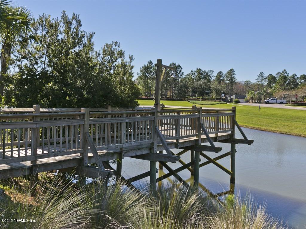 2048 River's Own Road St. Augustine, FL 32092 - Photo 34 of 38 a view of a lake with table and chairs
