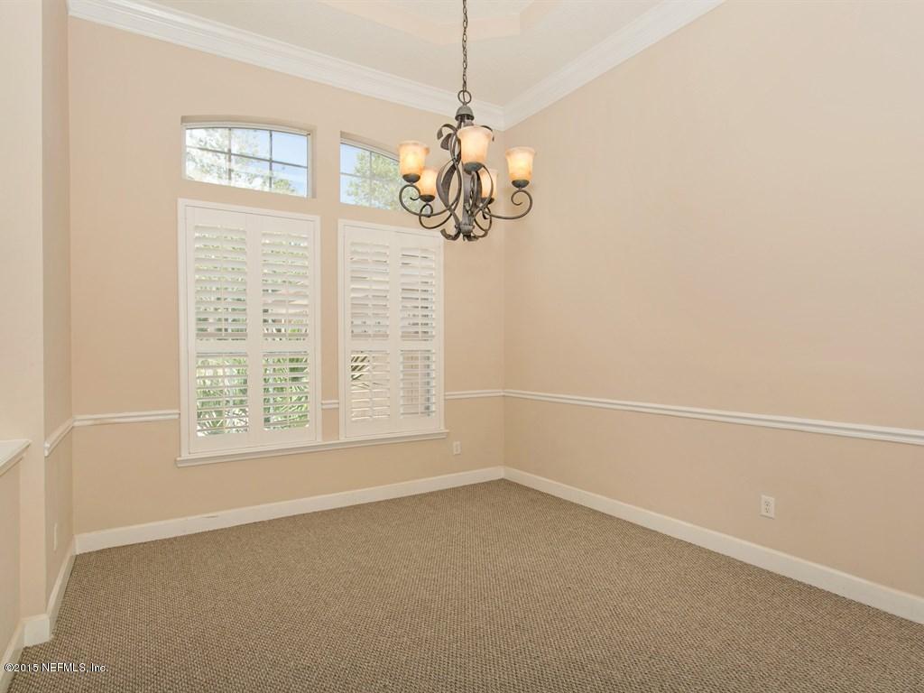 2048 River's Own Road St. Augustine, FL 32092 - Photo 4 of 38 a view of a room with a window and a chandelier