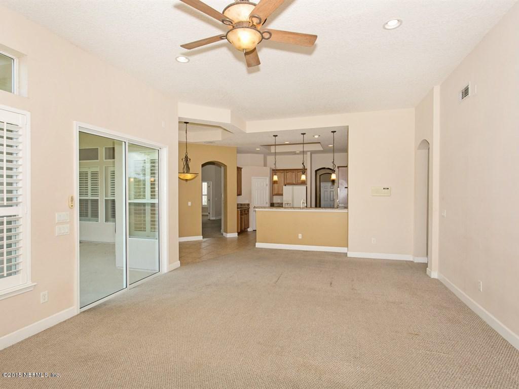 2048 River's Own Road St. Augustine, FL 32092 - Photo 8 of 38 a view of a big room with closet and windows