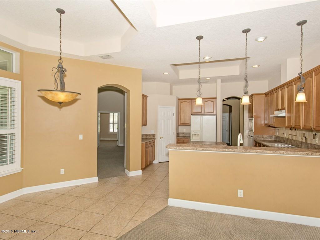 2048 River's Own Road St. Augustine, FL 32092 - Photo 9 of 38 a view of a kitchen with a sink a refrigerator and window