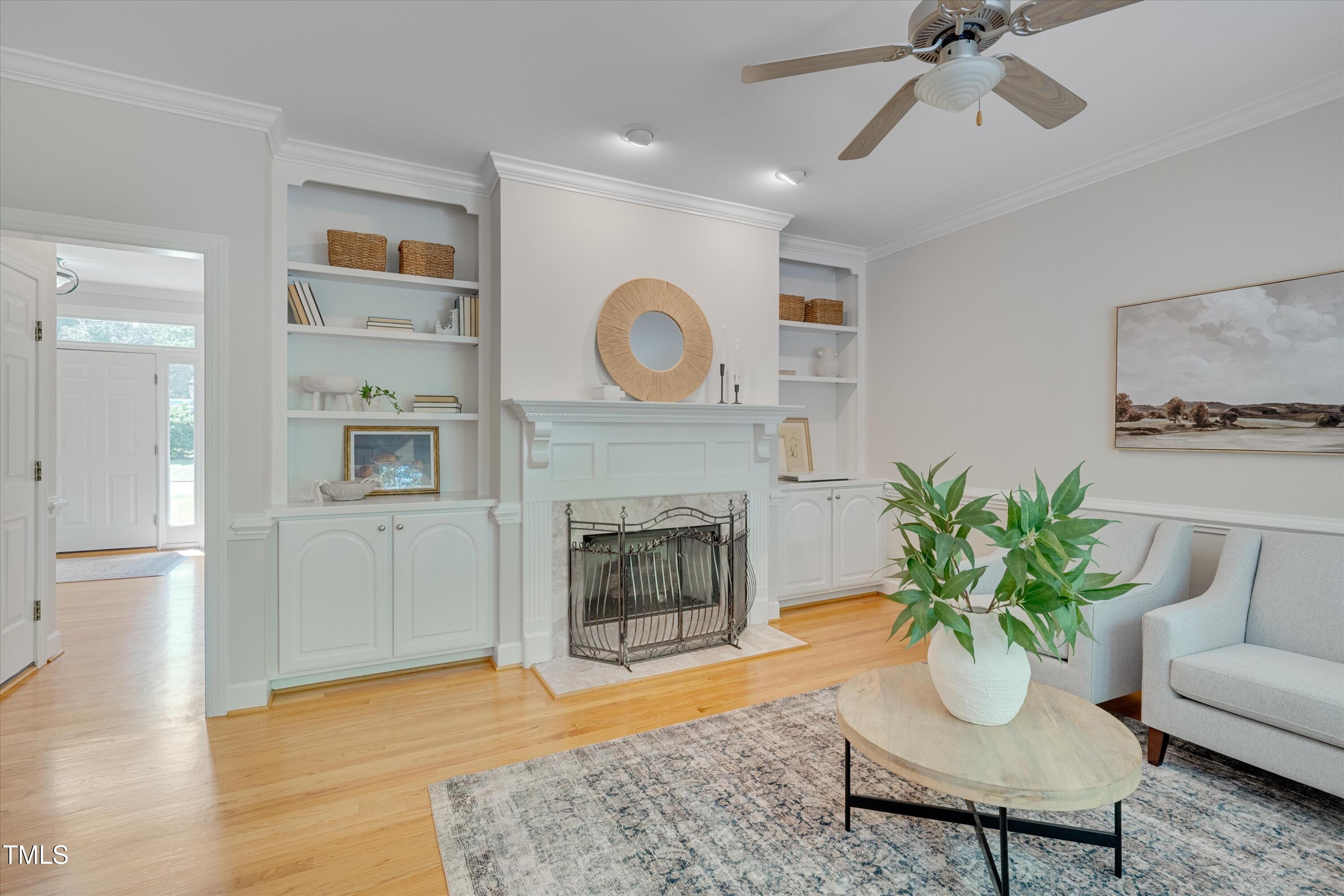 116 Ashworth Drive Durham, NC 27707 - Photo 14 of 60 a living room with furniture and a fireplace