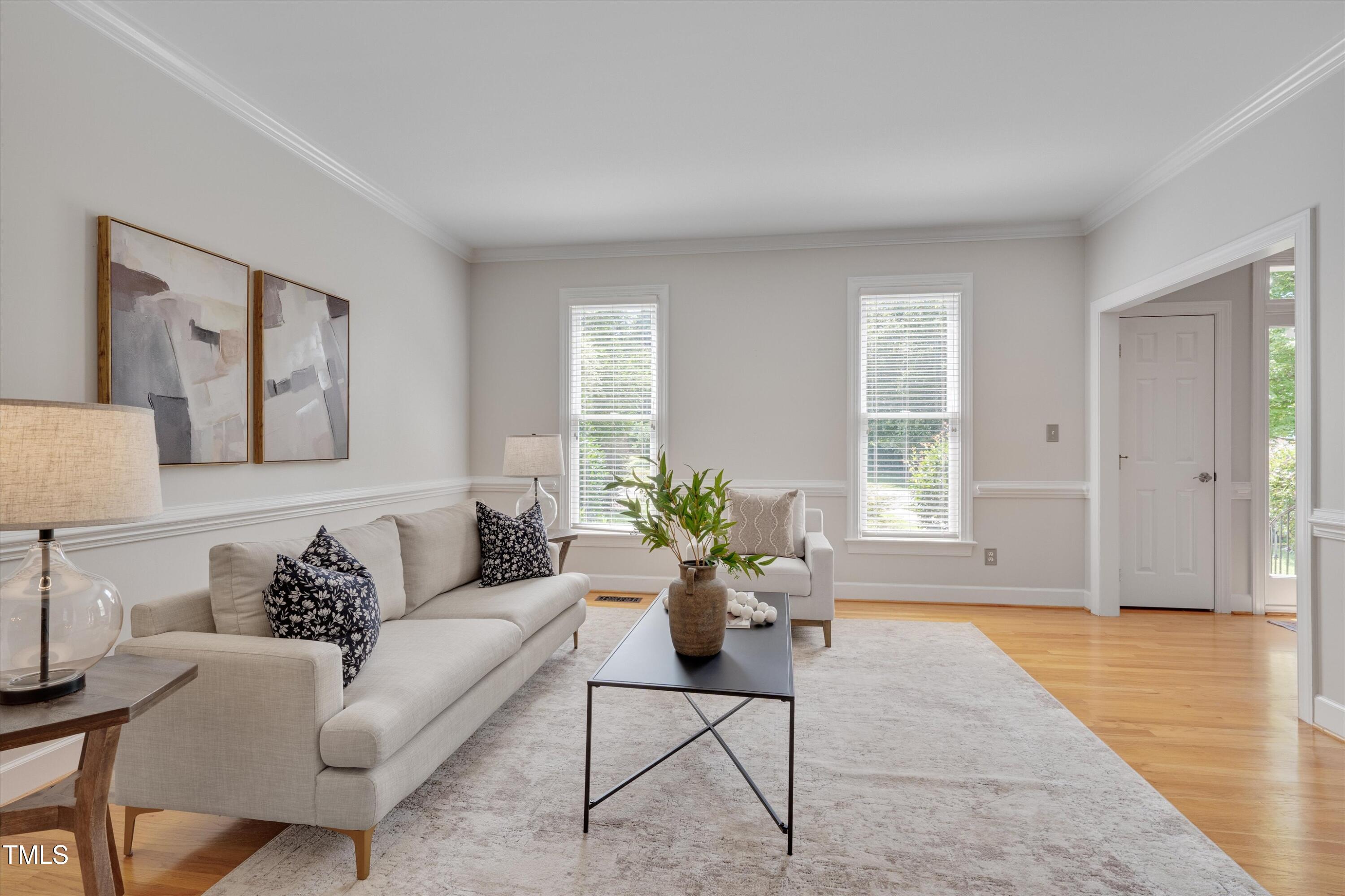 116 Ashworth Drive Durham, NC 27707 - Photo 2 of 60 a living room with furniture and wooden floor