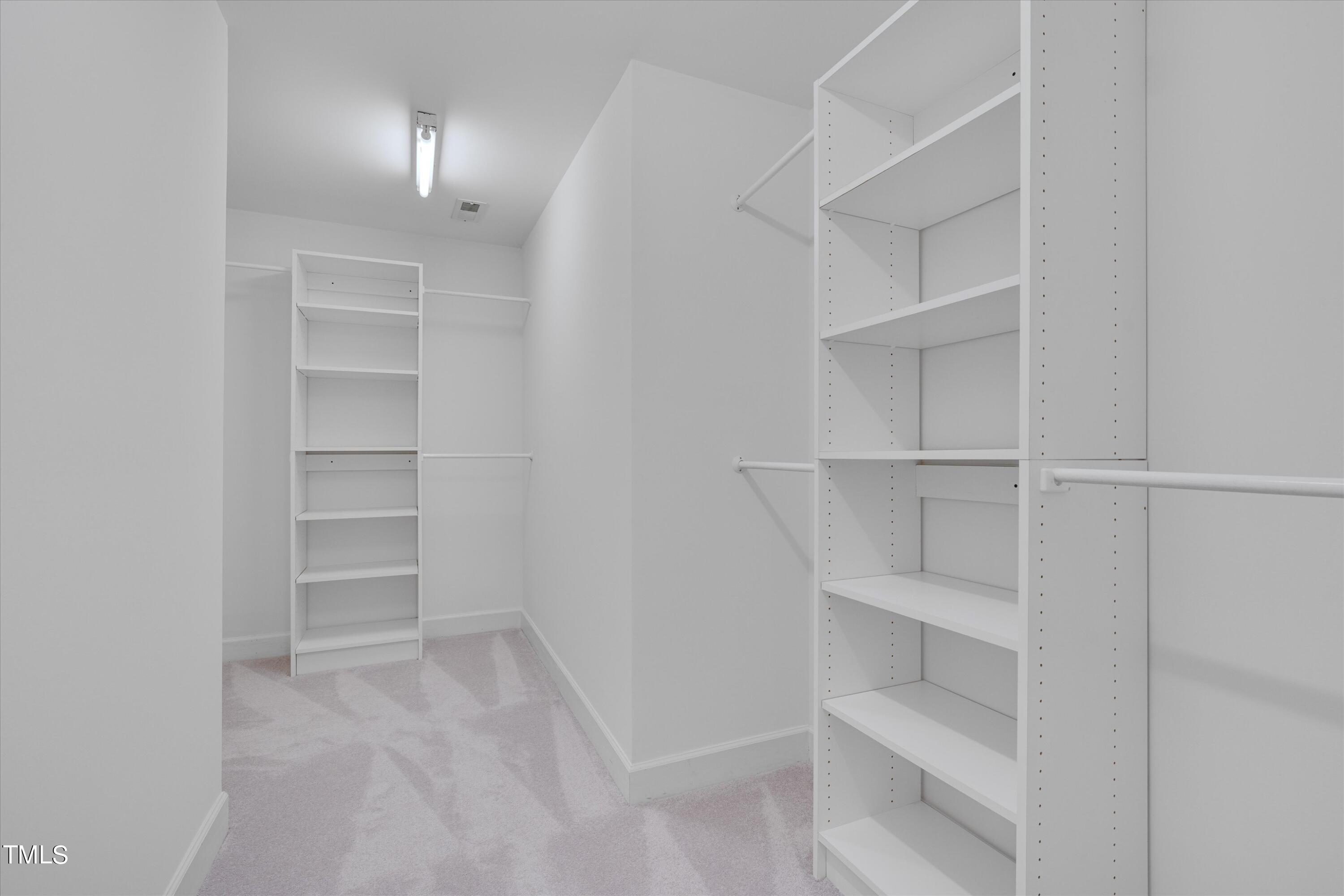 116 Ashworth Drive Durham, NC 27707 - Photo 27 of 60 a view of an empty walk in closet