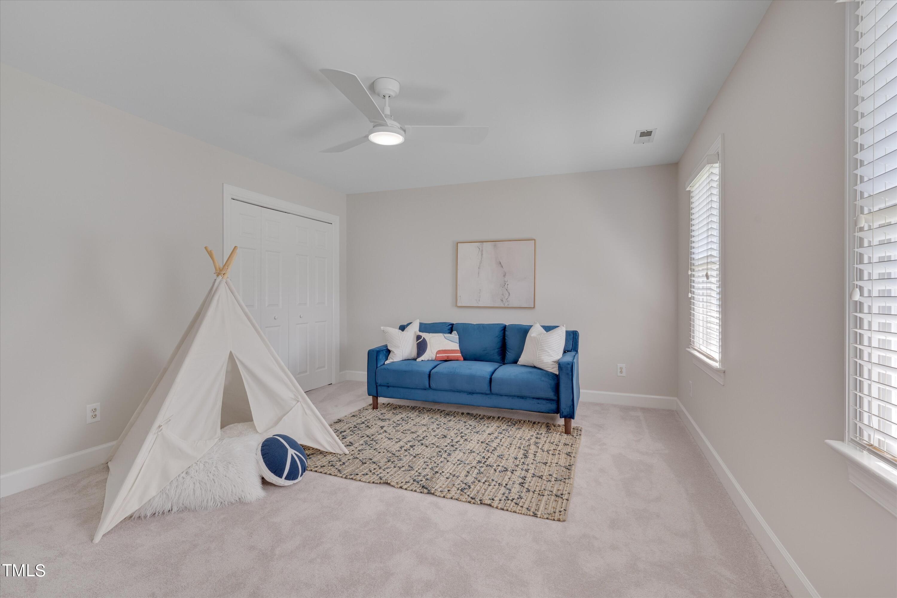 116 Ashworth Drive Durham, NC 27707 - Photo 32 of 60 a living room with furniture and a window