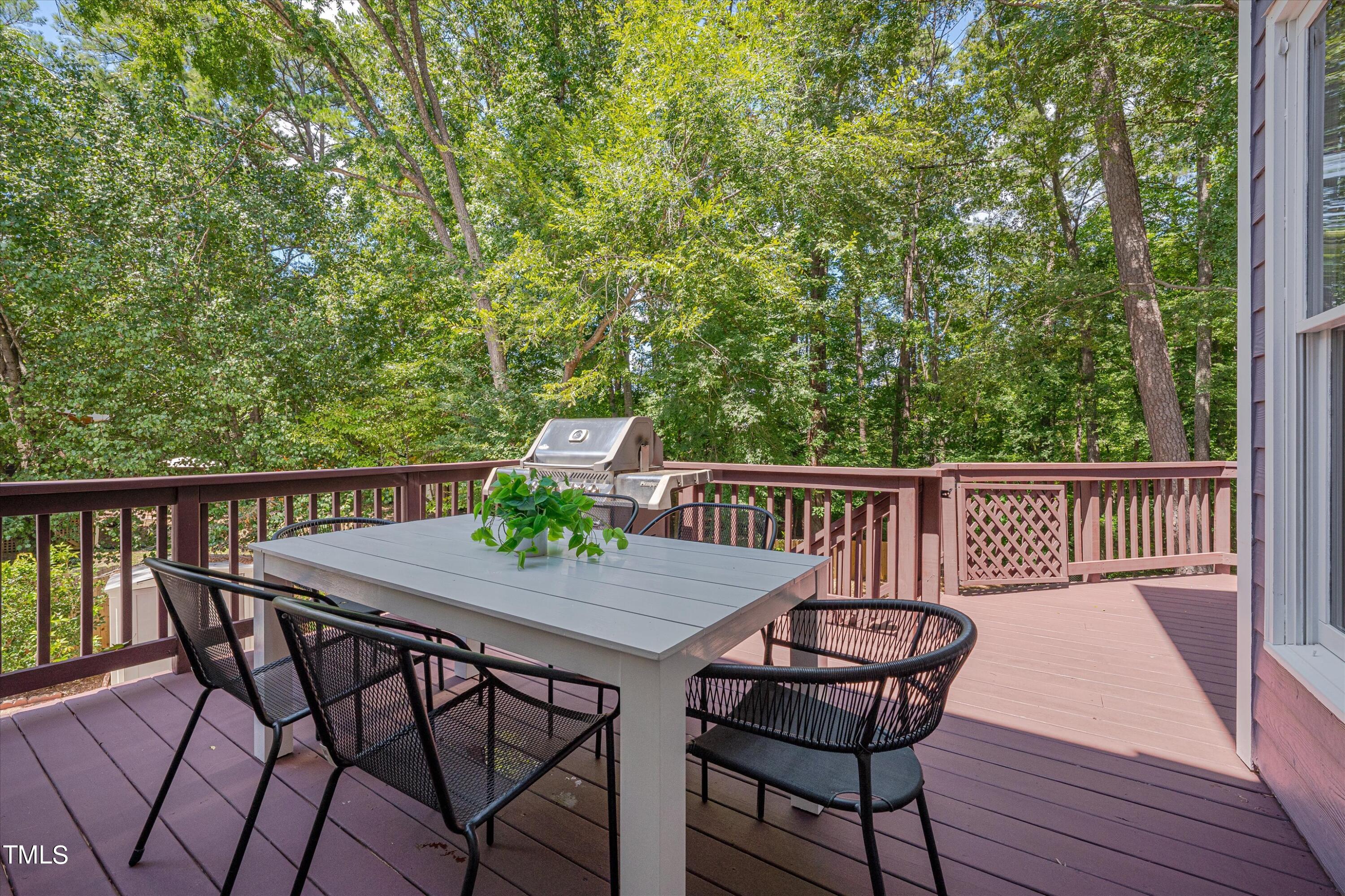 116 Ashworth Drive Durham, NC 27707 - Photo 39 of 60 a view of a deck patio and outdoor seating