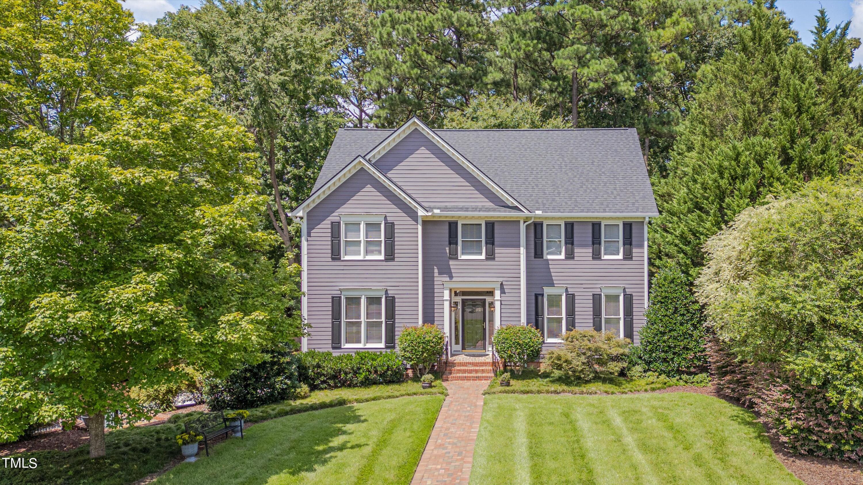 116 Ashworth Drive Durham, NC 27707 - Photo 4 of 60 a front view of a house with a yard