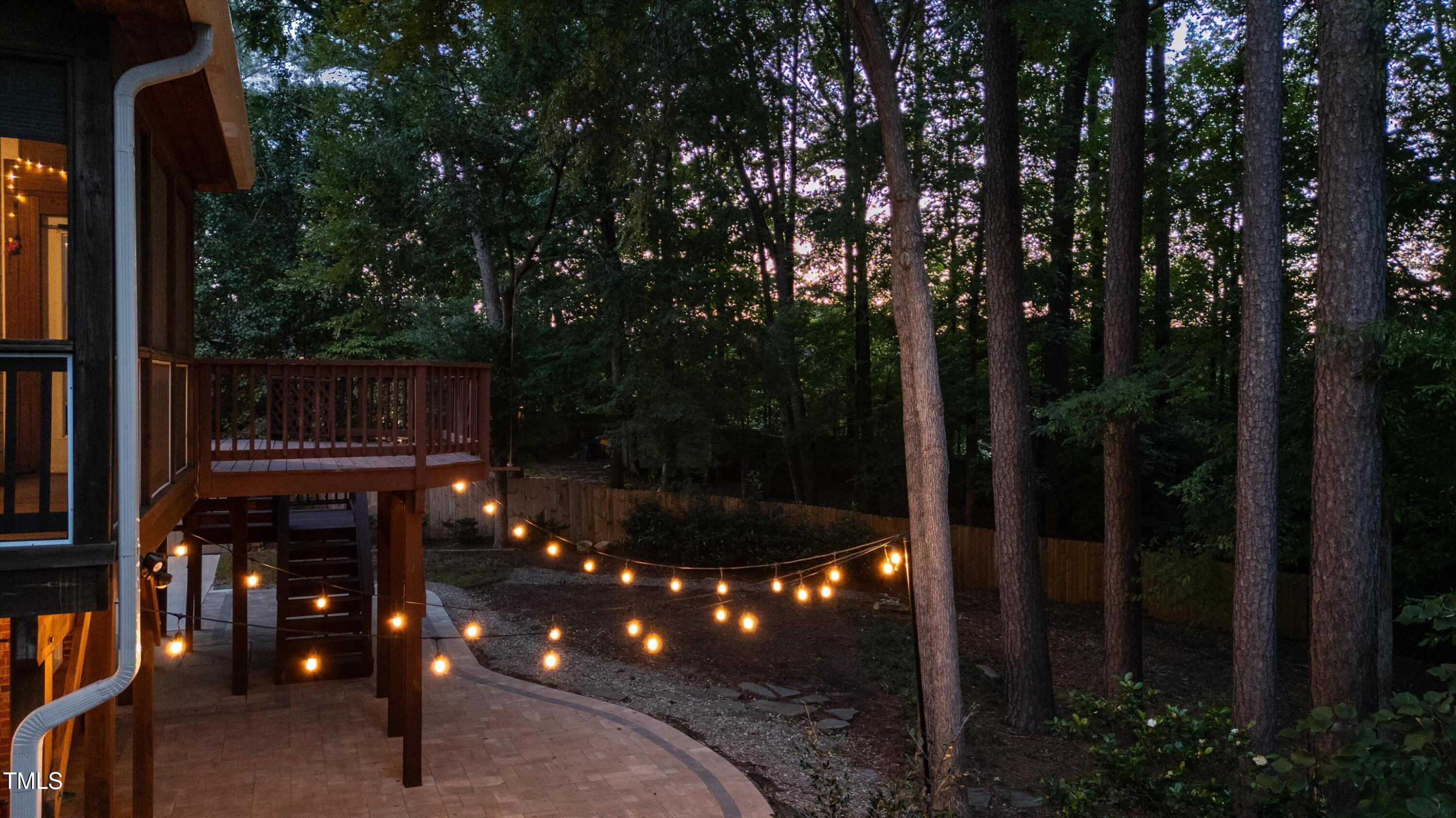 116 Ashworth Drive Durham, NC 27707 - Photo 45 of 60 a wooden bench sitting in front of a building