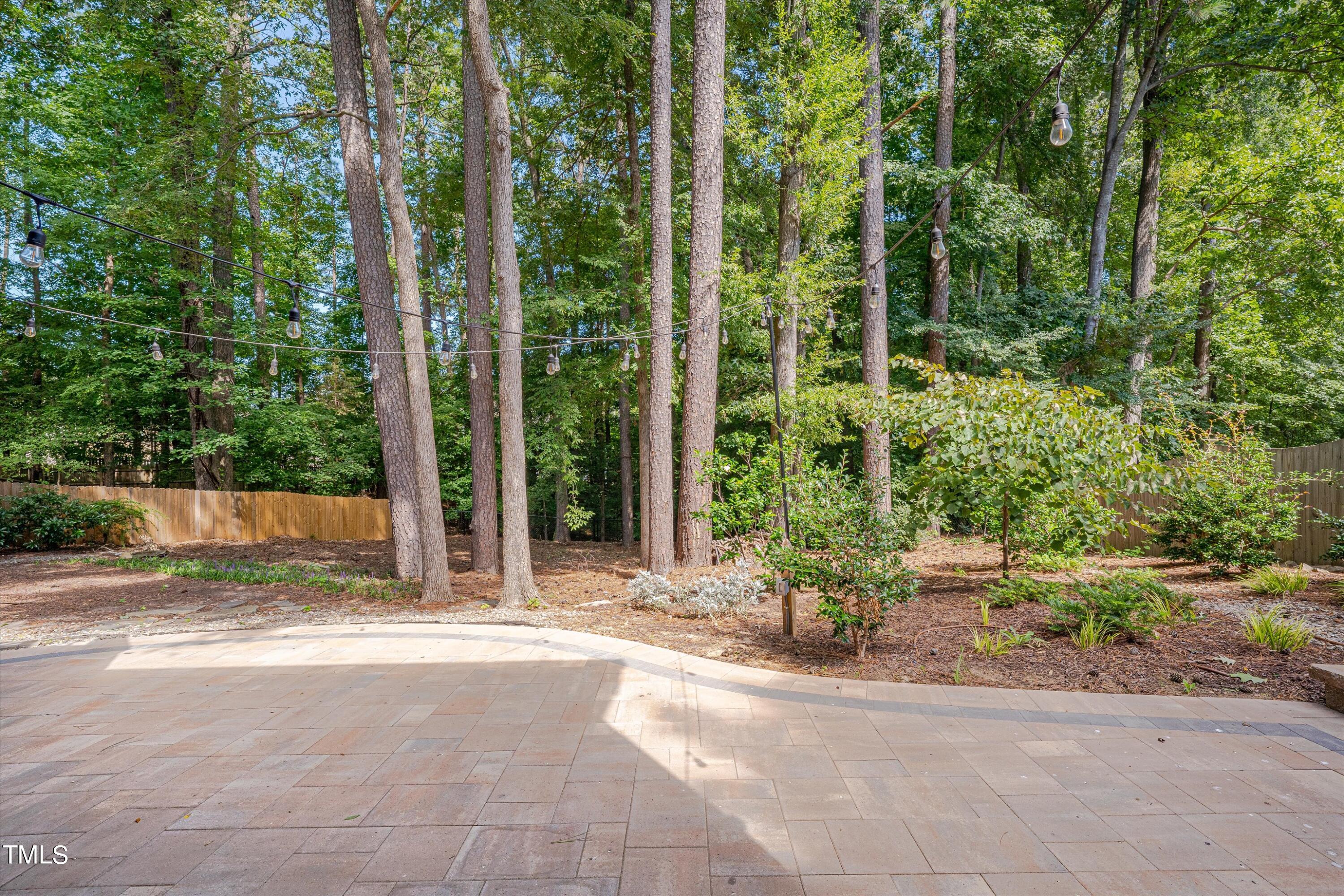 116 Ashworth Drive Durham, NC 27707 - Photo 50 of 60 a view of a garden with potted plants