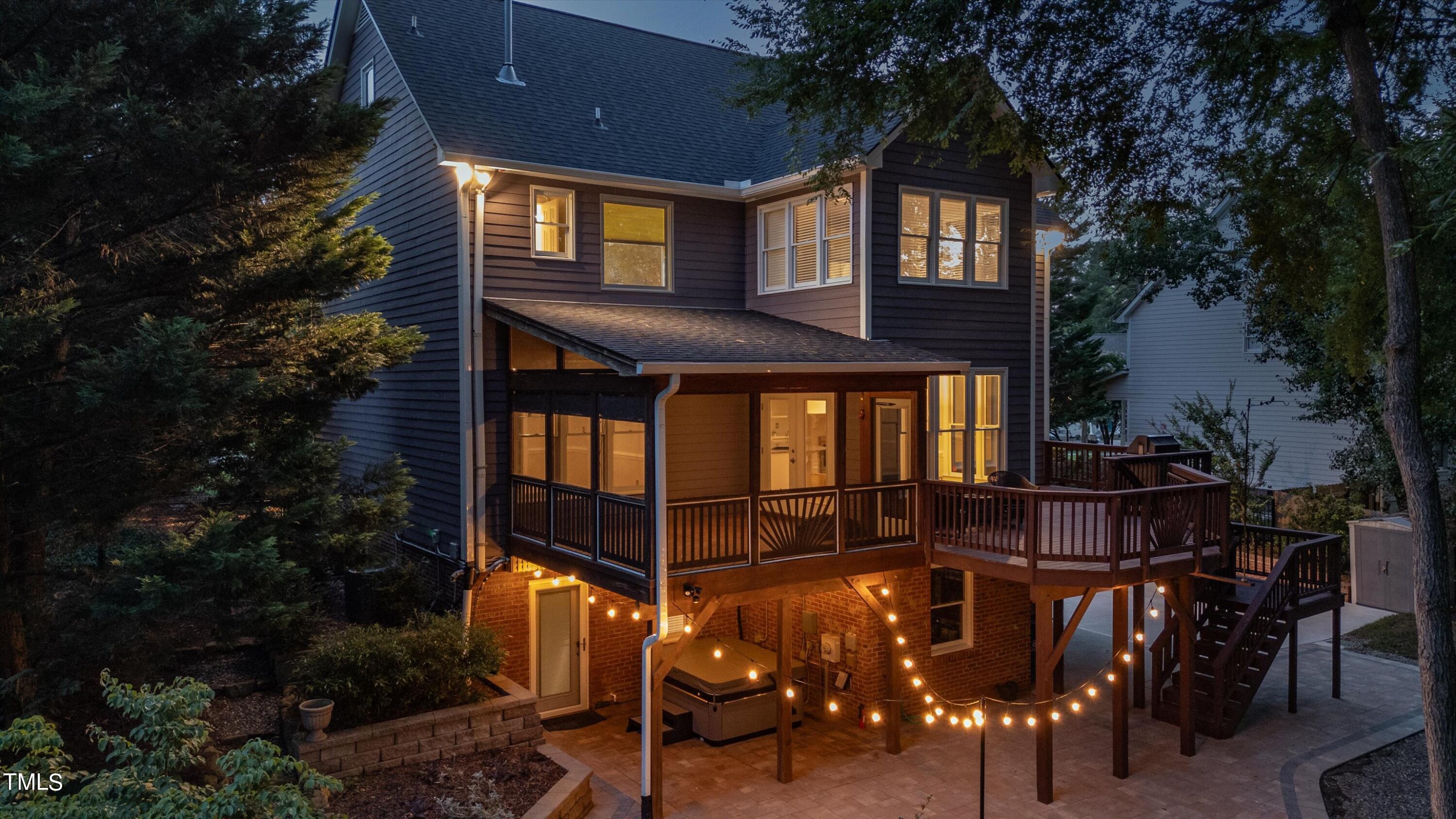 116 Ashworth Drive Durham, NC 27707 - Photo 7 of 60 a front view of a house with a yard glass top table and chairs