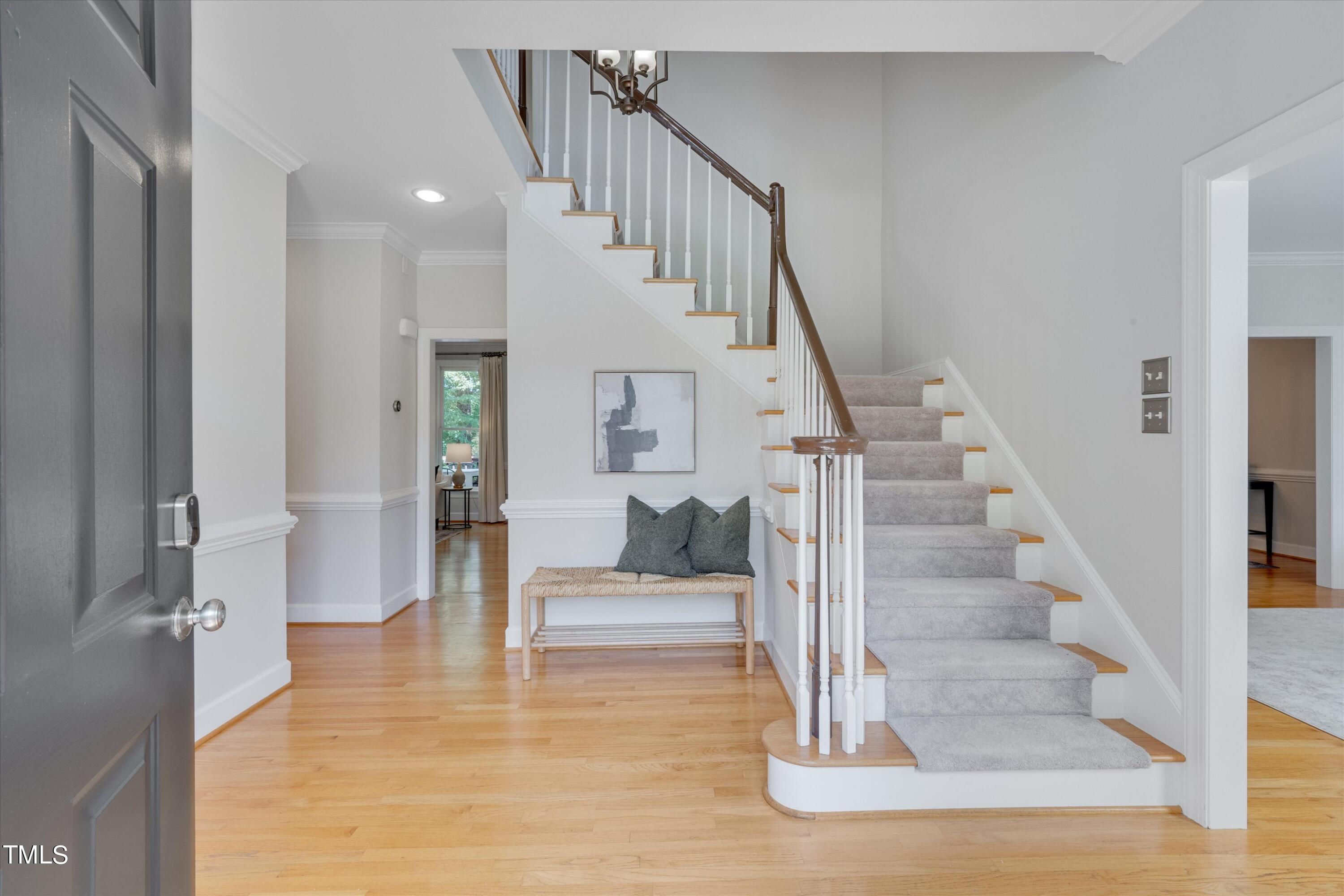 116 Ashworth Drive Durham, NC 27707 - Photo 10 of 60 a view of entryway and hall with wooden floor