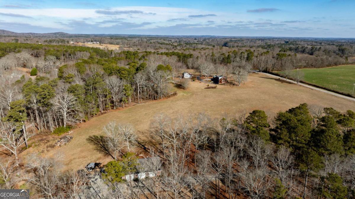 0 Old Centerpoint Road Carrollton, GA 30117 - Photo 11 of 11 a view of a lake with mountains in the background