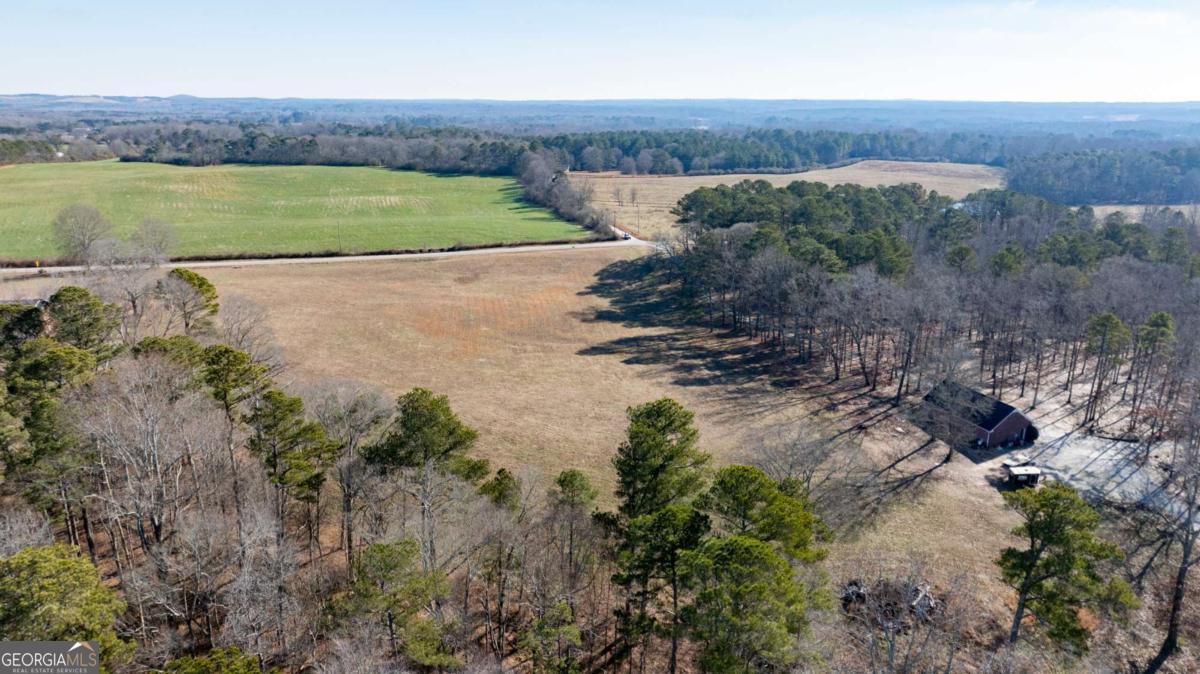0 Old Centerpoint Road Carrollton, GA 30117 - Photo 7 of 11 an aerial view of a house with a garden and lake view