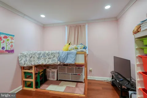 a room with furniture and a flat screen tv