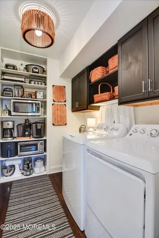 a bathroom with a sink a vanity and a shower