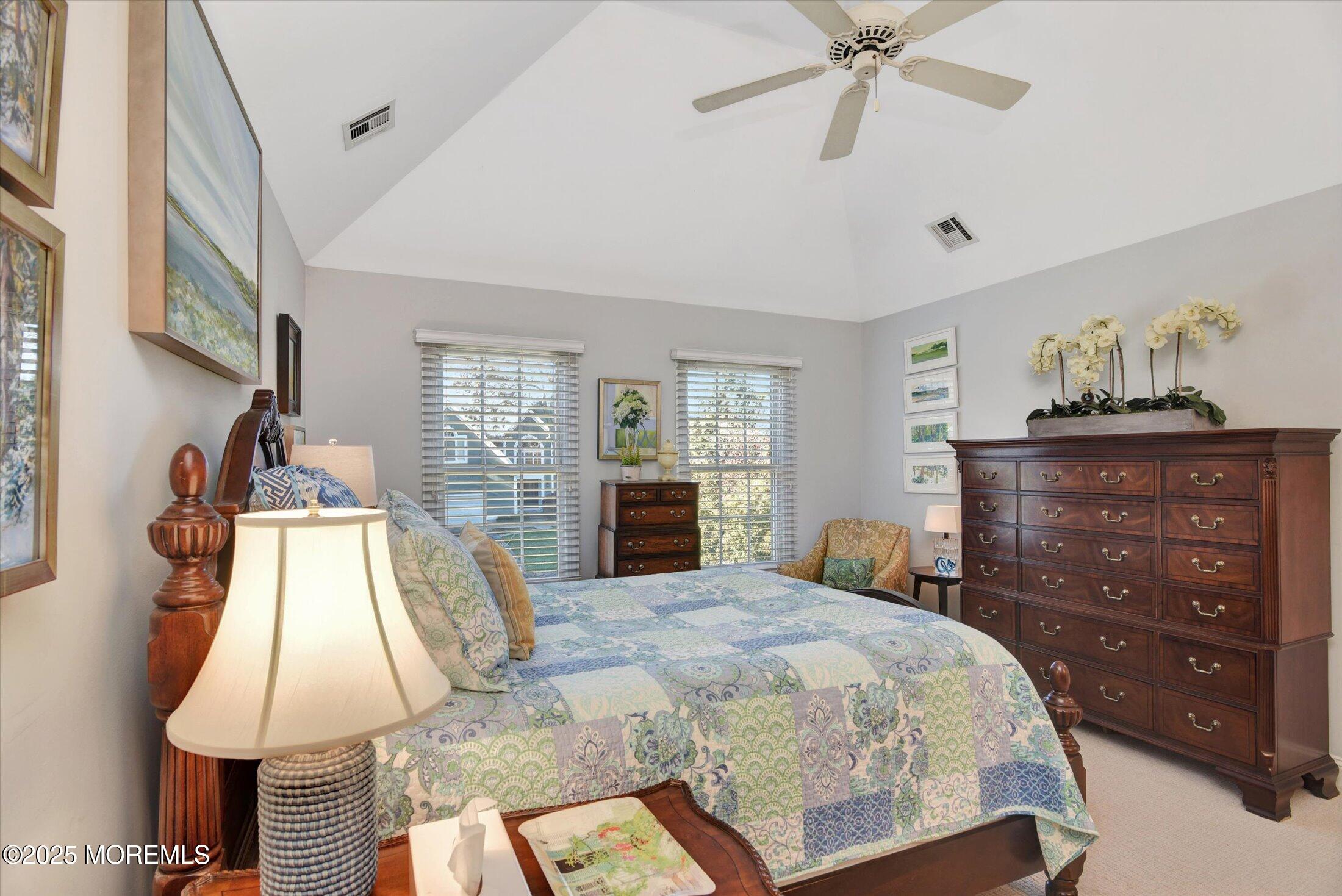 14 Lebanon Drive Brielle, NJ 08730 - Photo 25 of 42 a bed room with a bed and a lamp