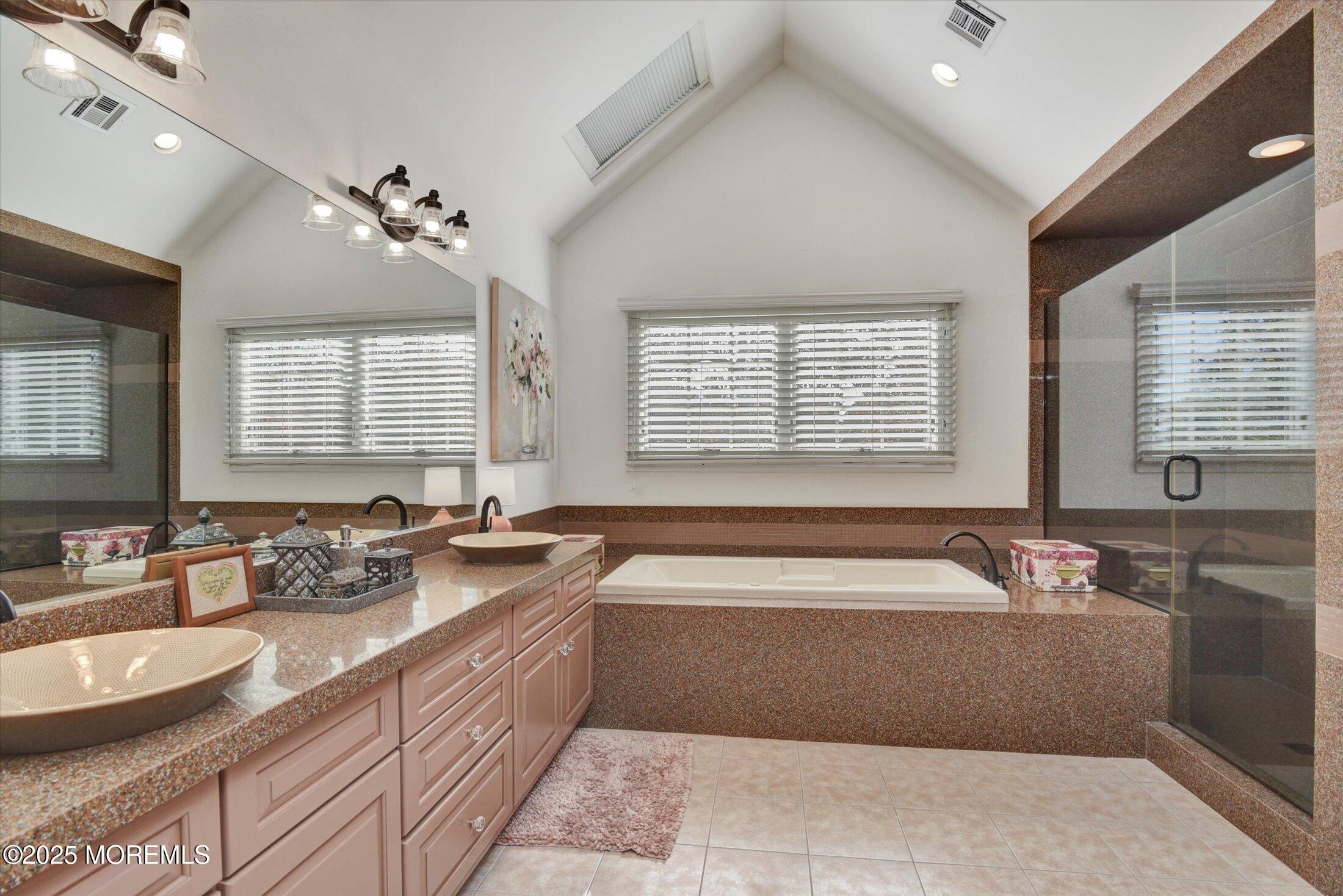 14 Lebanon Drive Brielle, NJ 08730 - Photo 26 of 42 a spacious bathroom with sinks mirror and a bathtub