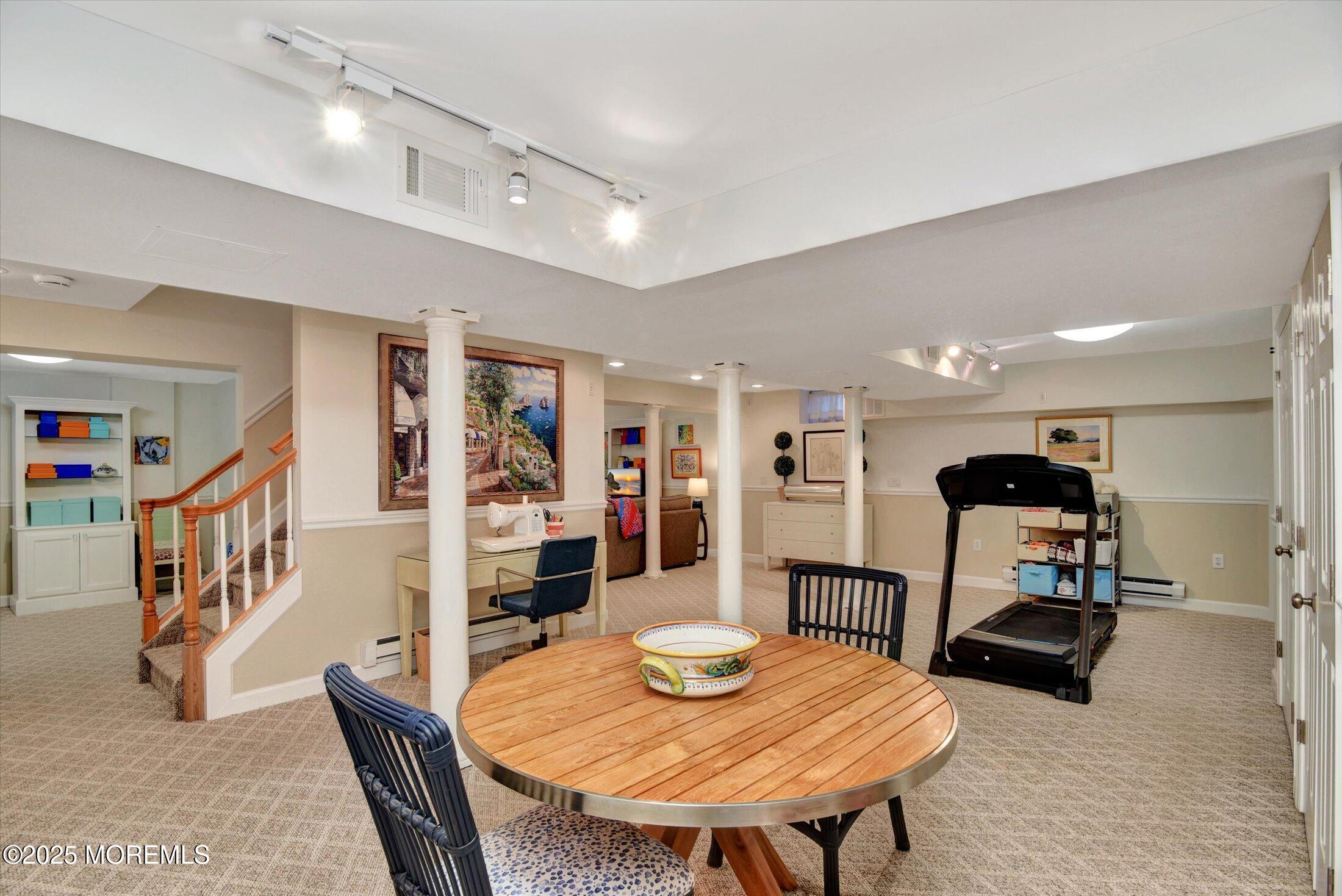 14 Lebanon Drive Brielle, NJ 08730 - Photo 34 of 42 a living room with furniture and a dining table