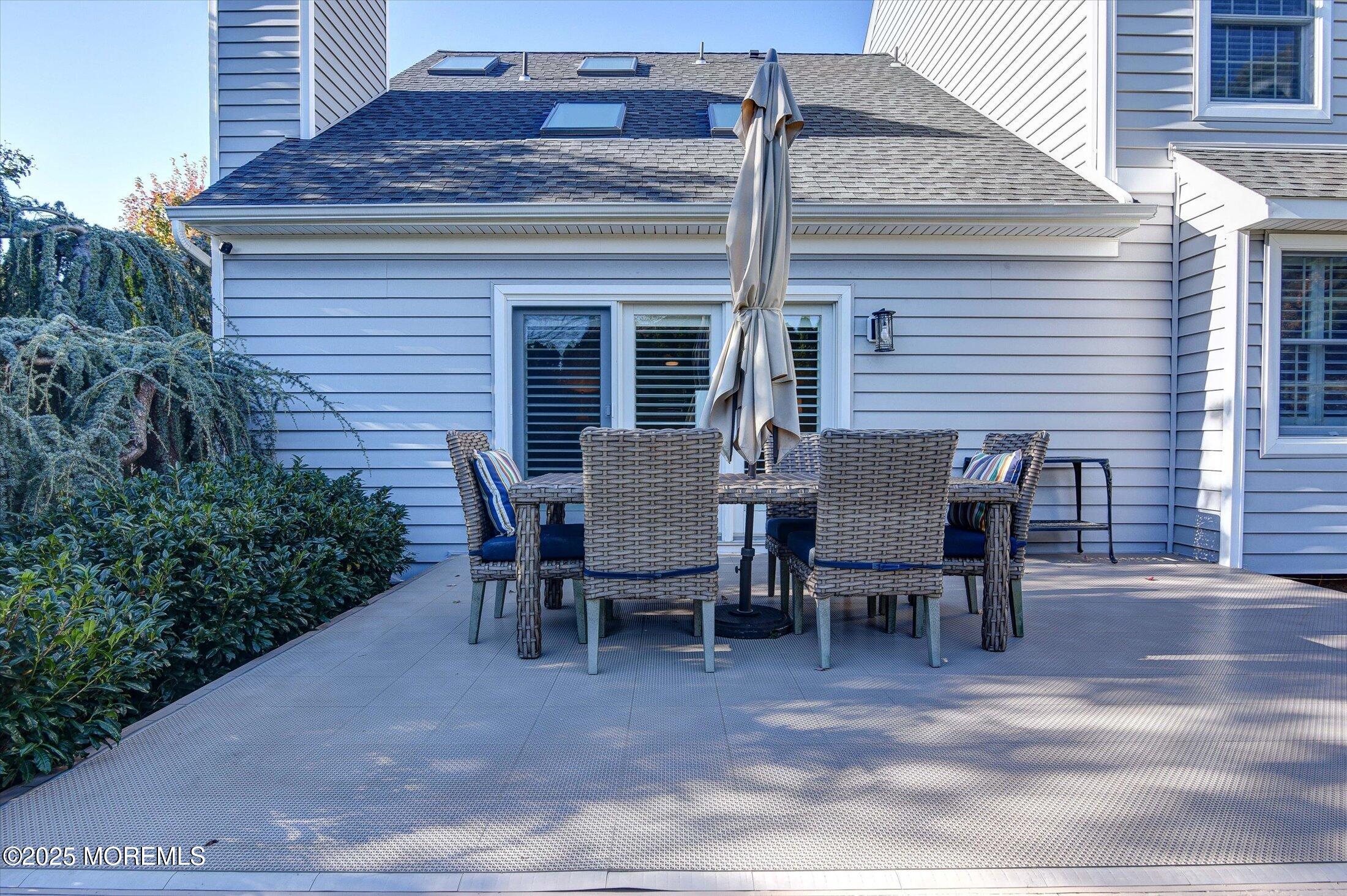 14 Lebanon Drive Brielle, NJ 08730 - Photo 37 of 42 a view of a house with patio and backyard