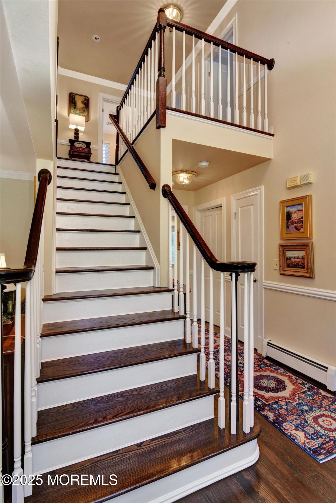 14 Lebanon Drive Brielle, NJ 08730 - Photo 5 of 42 a view of entryway with wooden floor and stairs