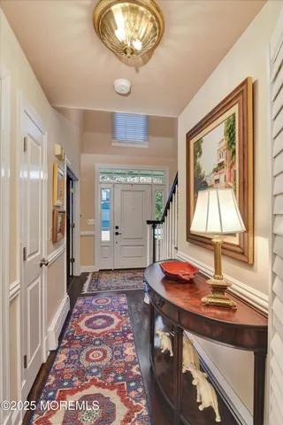 a view of a hallway with windows