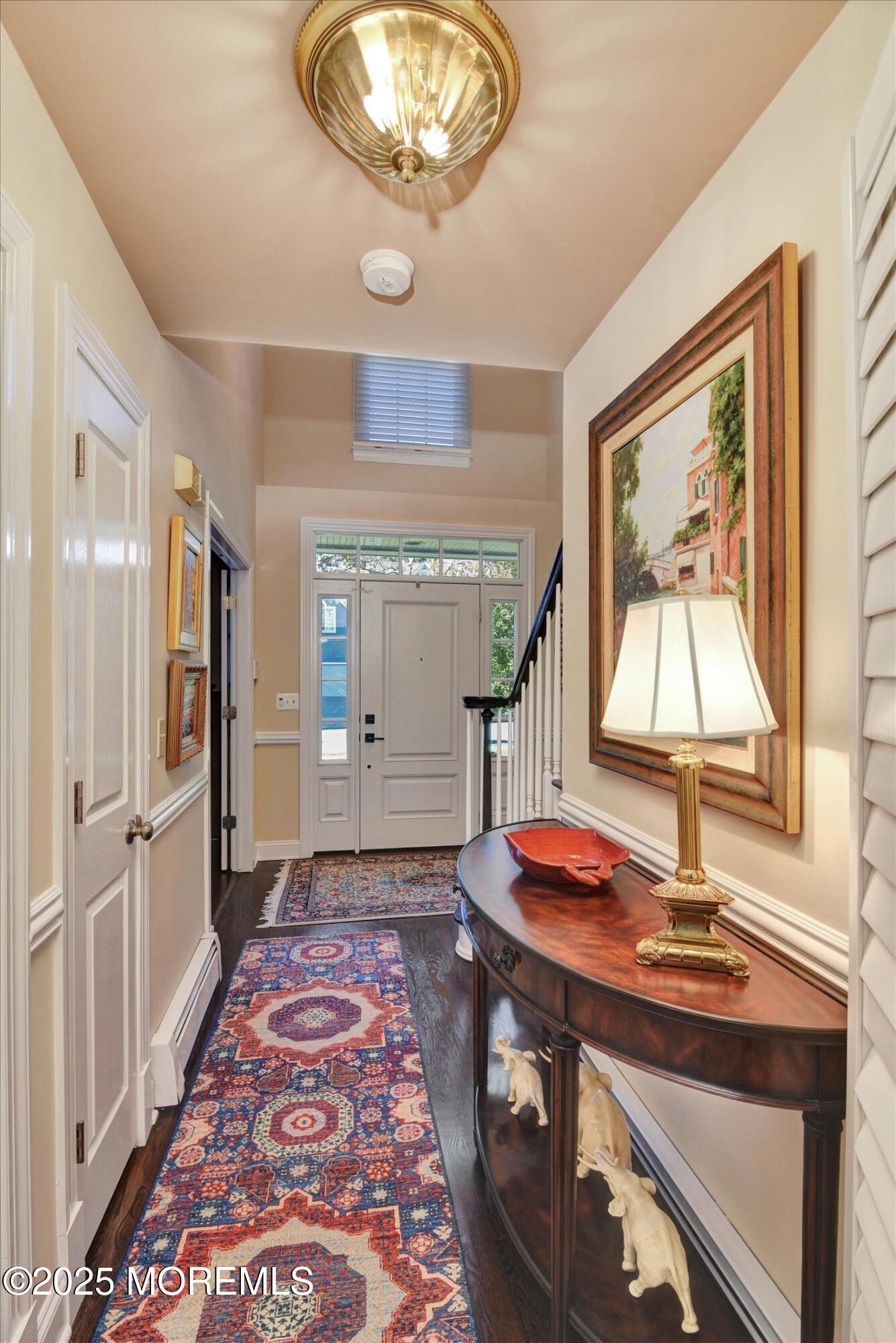 14 Lebanon Drive Brielle, NJ 08730 - Photo 6 of 42 a view of a hallway with windows