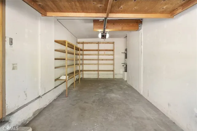 a view of a big room with closet and racks