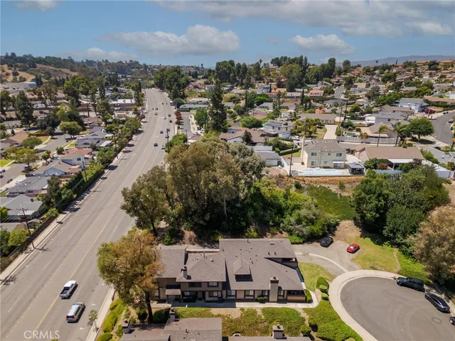 an aerial view of a house with a garden