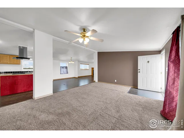 a kitchen with stainless steel appliances granite countertop a stove and a refrigerator