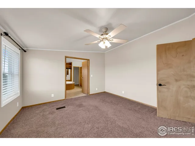 a bathroom with a sink mirror and vanity
